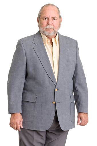 Senior hombre en traje graves photo