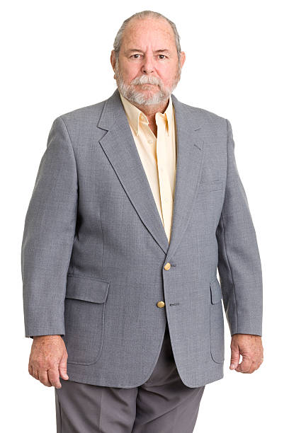 sérieux homme senior en costume - overweight men businessman isolated photos et images de collection