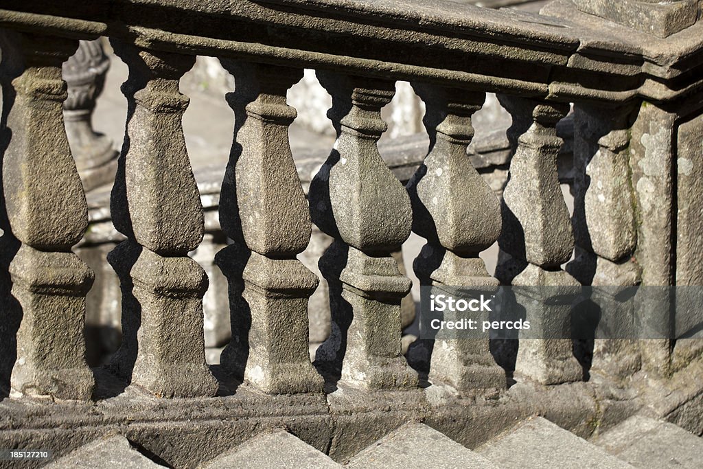 Ancient banister Detail of a beautifully carved ancient banister in Obradoiro square at the entrance of Santiago de Compostela cathedral, Spain. A Coruna Stock Photo