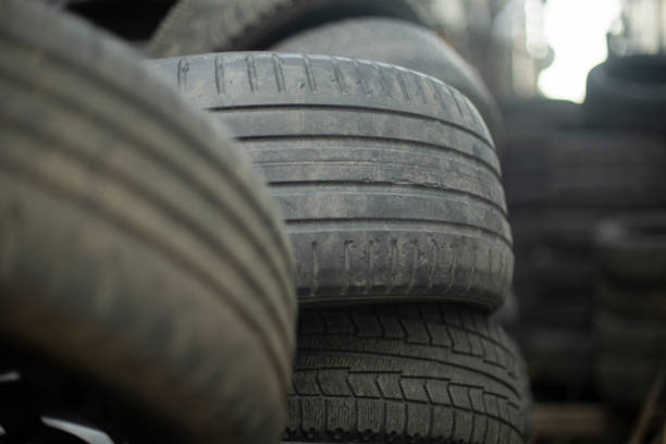 Tires. Old wheels. Tires in a landfill. Rubber Wheels.