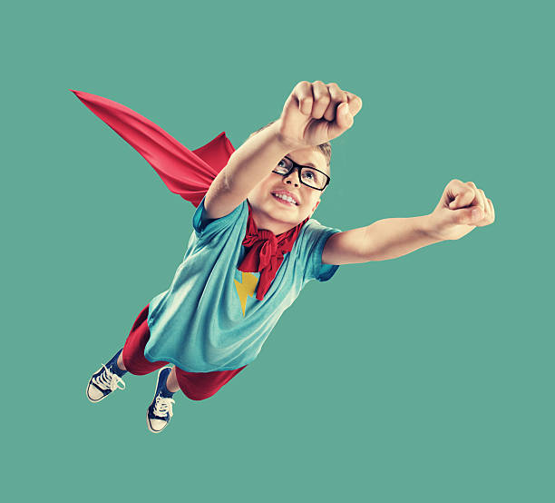 Little Superhero A little superhero ready to save the world cape garment stock pictures, royalty-free photos & images
