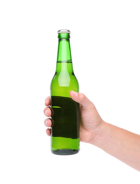 istock Hand holding up a green beer bottle 185131085