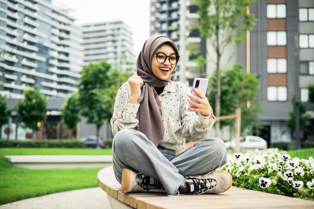 istock Young woman using a smartphone 1851363897