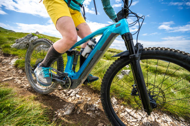 istock Woman riding down fast on electric bike 1851364352