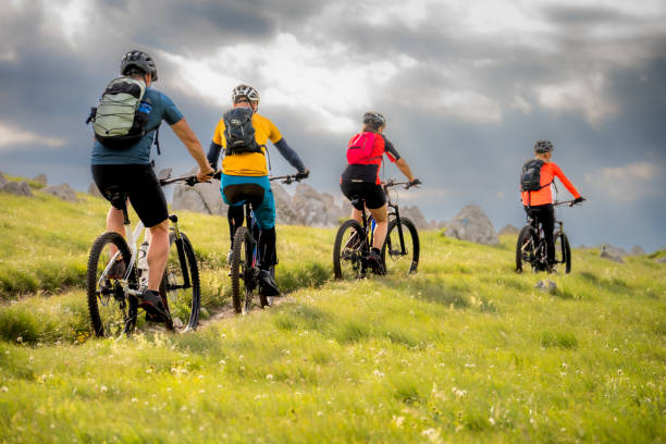 istock Cyclists group riding electric mountain bikes 1851364370