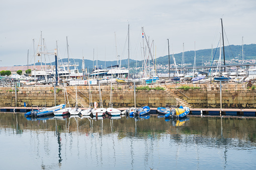 Vigo, Spain - July 5 2023: Boats moored in Vigo port, Pontevedra, Galicia, Spain is the biggest fishing port in the world, selective focus