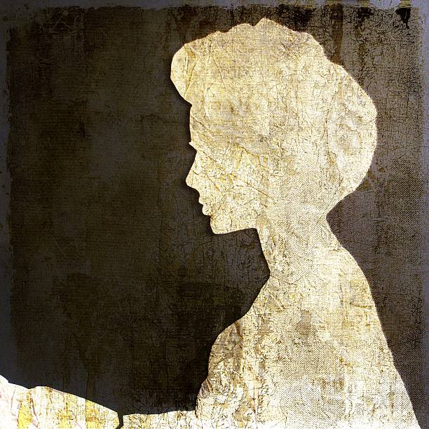 istock Woman profile cut in crumpled paper 185139749