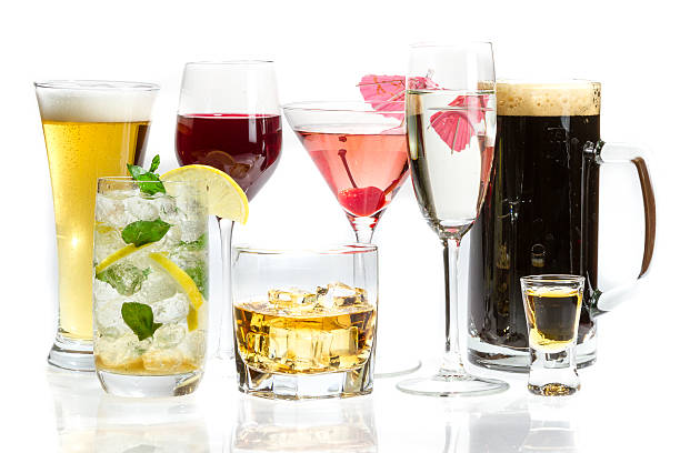 Different glasses with a variety of alcohol drinks