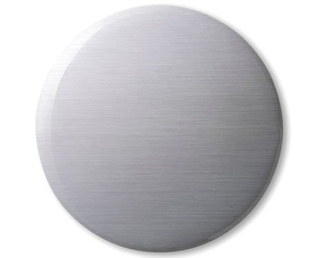 Overhead shot of blank silver badge, isolated on white with clipping path.