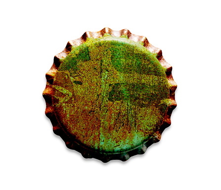 Overhead shot of rusty bottle cap, isolated on white with clipping path.