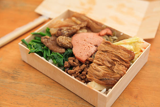 Traditional lunch box in taiwan with wood's box(Rice,Tofu,vegetable,veggie meat,mushroom)