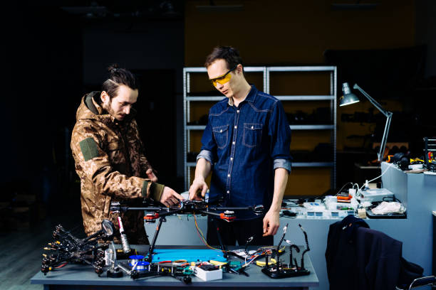 istock Engineer presenting new technology fpv combat drone to military soldier 1851445292