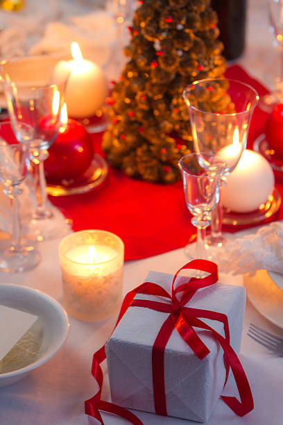 istock Candlelight on a table decorated beautifully for Christmas 185144998