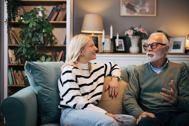 istock Granddaughter and grandfather are having a conversation 1851454111