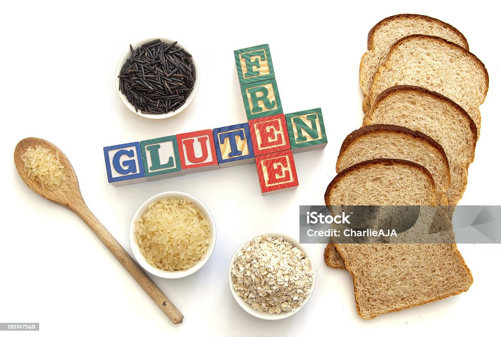 Gluten free Gluten free products around block letters, including wild rice, oats and bread Celiac Disease Stock Photo