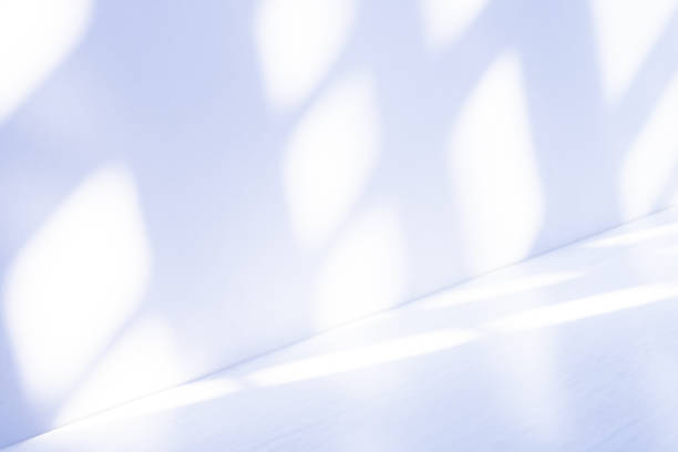 istock Wall interior background, studio  and backdrops show products.with shadow from window color white and blue light. background for text insertion and presentation product 1851519304