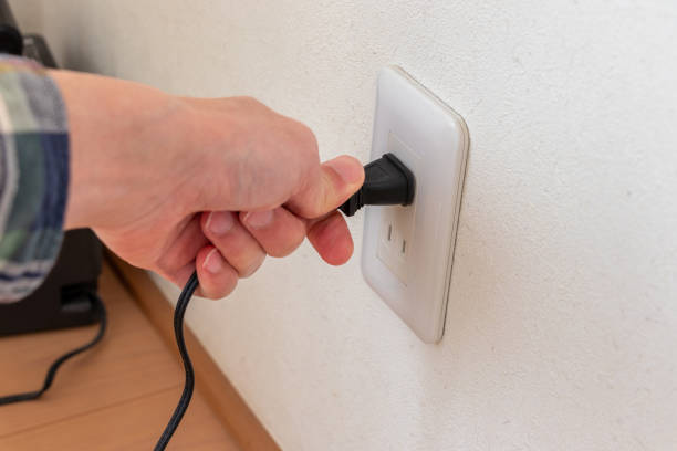 istock Wall outlet and equipment power plug 1851522464