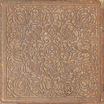 Antique Cast Iron Floor Tile with Floral Pattern.