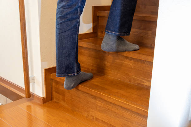 istock A man going up the wooden stairs 1851541743