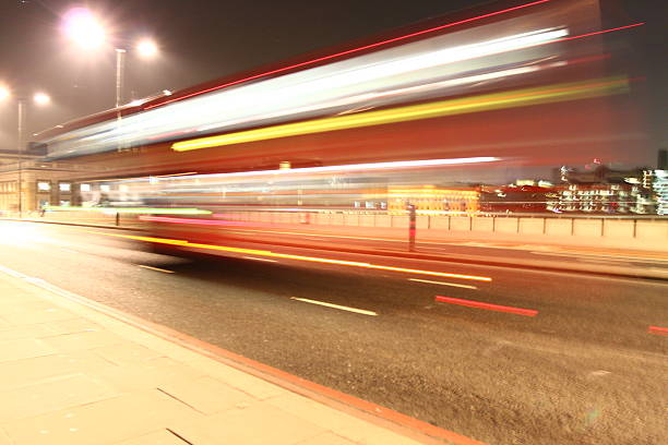 istock London Bus Passing at Night 185155781