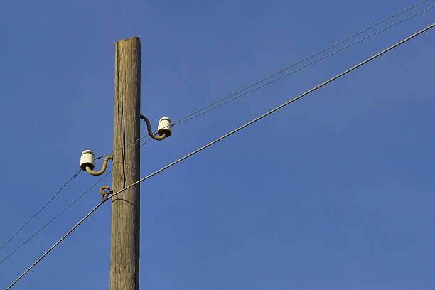 istock Wooden pole with electrical wires. 185157244