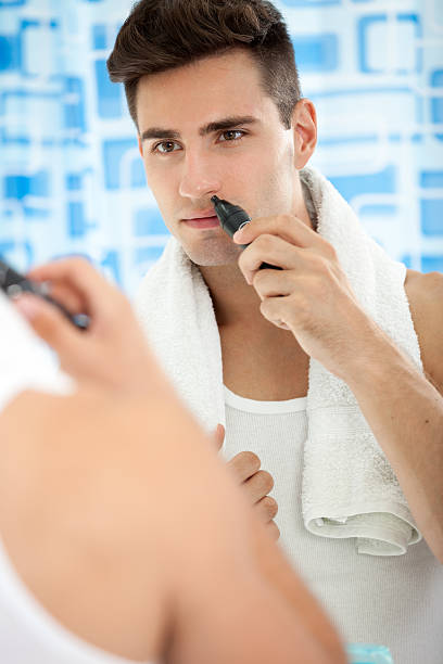 Guy Remove Hair From His Nose Stock Photos, Pictures & Royalty-Free Images  - iStock
