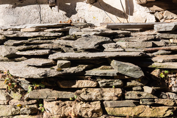 istock Abstract texture of old stone fence 1851581138
