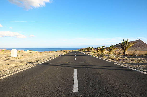 istock Lonely Road in the Desert 185158388