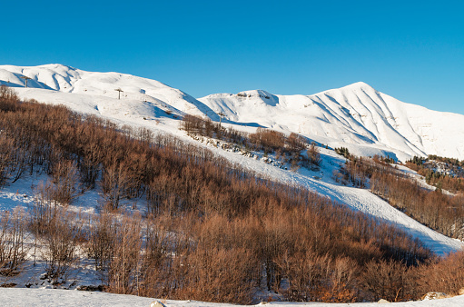 Alpe d'Huez, first snow in winter, ski slopes still close...