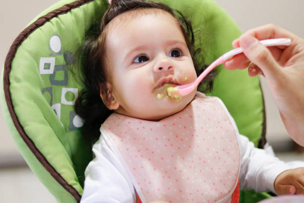 istock Baby in high chair 1851622095