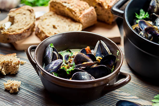 istock Mussels and fresh vegetables served at home 185165452