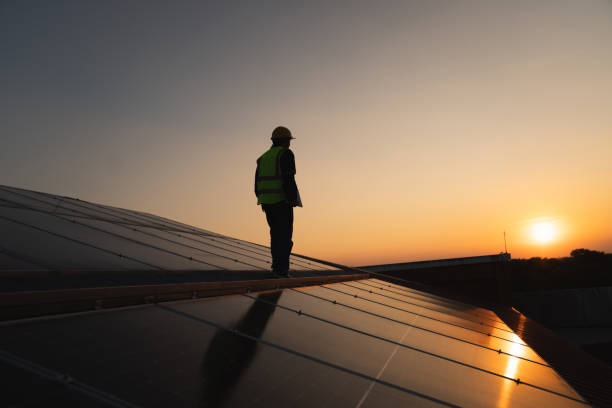 istock Service engineer checking solar cell on the roof for maintenance if there is a damaged part. Engineer worker install solar panel. Clean energy concept. 1851660888