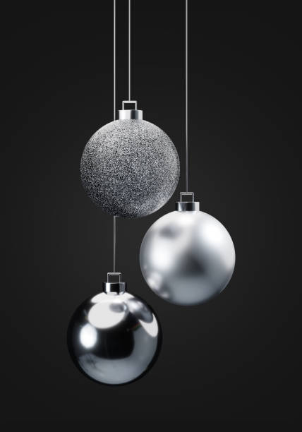 istock Three silver Christmas balls hanging on gold strings 3d render illustration. Christmas decorations. 1851686928