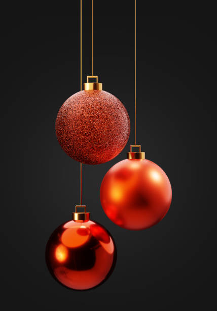 istock Three red Christmas balls hanging on gold strings 3d render illustration. Christmas decorations. 1851687458