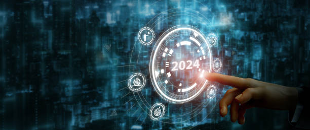 istock 2024 automation technology and business transformation, adaptation, changing concept. Transform business model and automation strategy for thriving business. Finger about to press a button with 2024. 1851710449