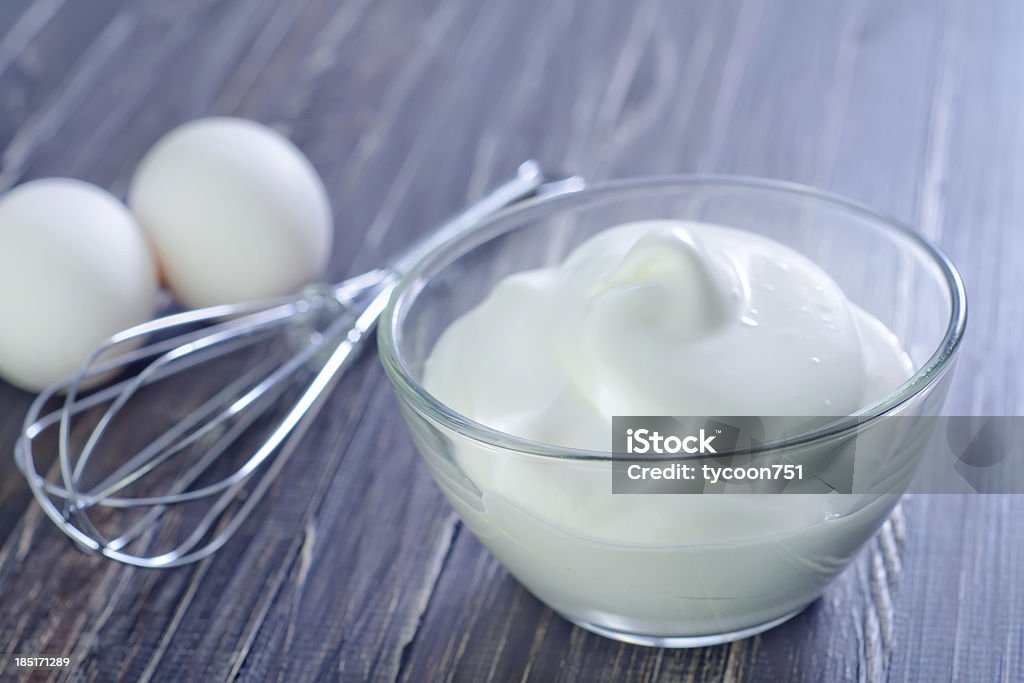 whipping eggs whipping eggs with whisk Abstract Stock Photo