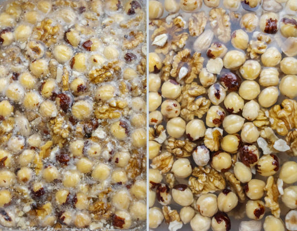 Before and after. Soaking nuts. Girl shows dirty seeds. Chemical processing of food. Digestive problems are caused by intolerance peanuts, allergies cashews, hazelnuts. Allergic reaction phytic acid. remojar frutos secos. la chica muestra semillas sucias. procesamiento químico de alimentos. los problemas digestivos son causados por la intolerancia a los cacahuetes, las alergias, los anacardos, las avellanas. reacción alérgica al ácido fítico. ante