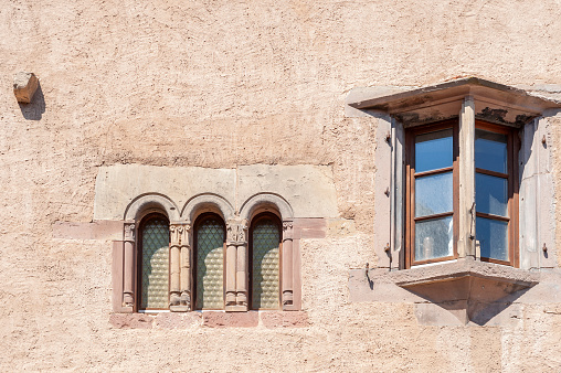 Window at Romanesque house Maison Romane in Obernai. Bas-Rhin department in Alsace region of France