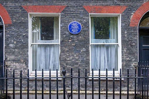 Lansdowne Terrace, London, England - October 28th 2023: Memorial plaque on a wall to mark the Horizon magazine and its writers: George Orwell and Sir Stephen Spender. This kind of plaques can be seen all over London