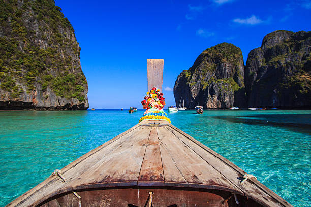istock Ship Nose Front View Long tail boat at sea Thailand 185178318