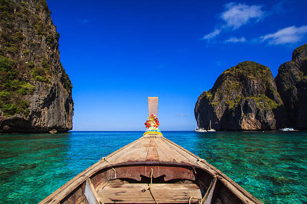 istock Ship Nose Front View Long tail boat at sea Thailand 185178807