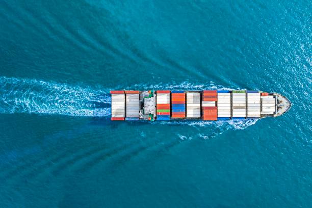 istock Aerial top view container ship vessel cargo carrier at blue sea. 1851801112
