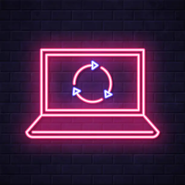 Vector illustration of Refresh or reload on laptop. Glowing neon icon on brick wall background