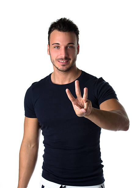 istock Handsome young man counting to three with fingers and hands 185181904