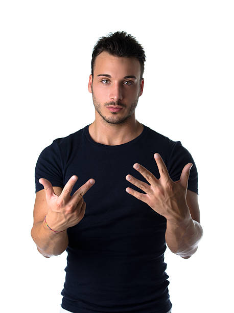 istock Handsome young man counting to eight with fingers and hands 185182030