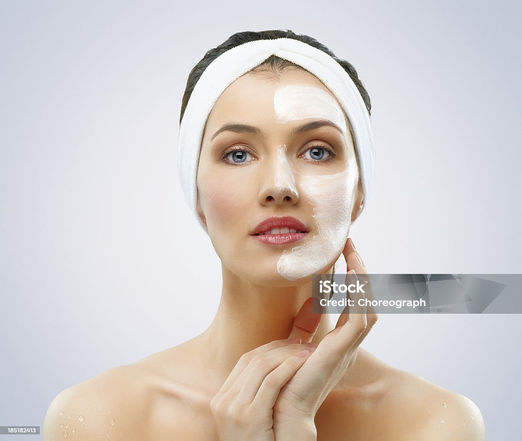 cosmetic mask beauty women getting facial mask Adult Stock Photo