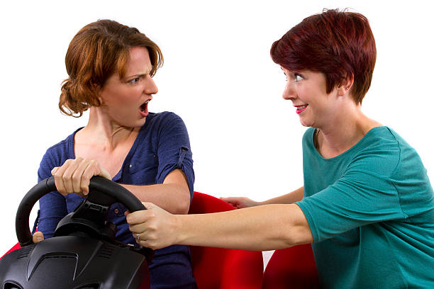 istock Annoying female passenger by being a backseat driver 185184524