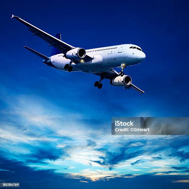 Evening Flight Stock Photo - Download Image Now - Air Vehicle, Airplane, Blue