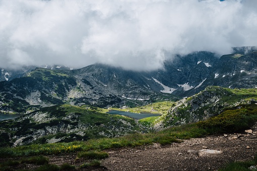 A stunning aerial view of the Seven Rila Lakes against a cloudy sky in Bulgaria