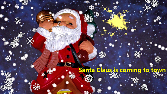 Santa Claus is coming to town, snowfall and sparkling stars